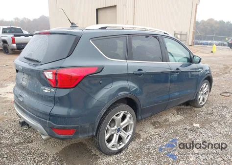 2019 Ford Escape Titanium z USA, uszkodzony, nr VIN 1FMCU9J98KUB43417
